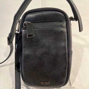 Tumi Black leather small crossbody bag